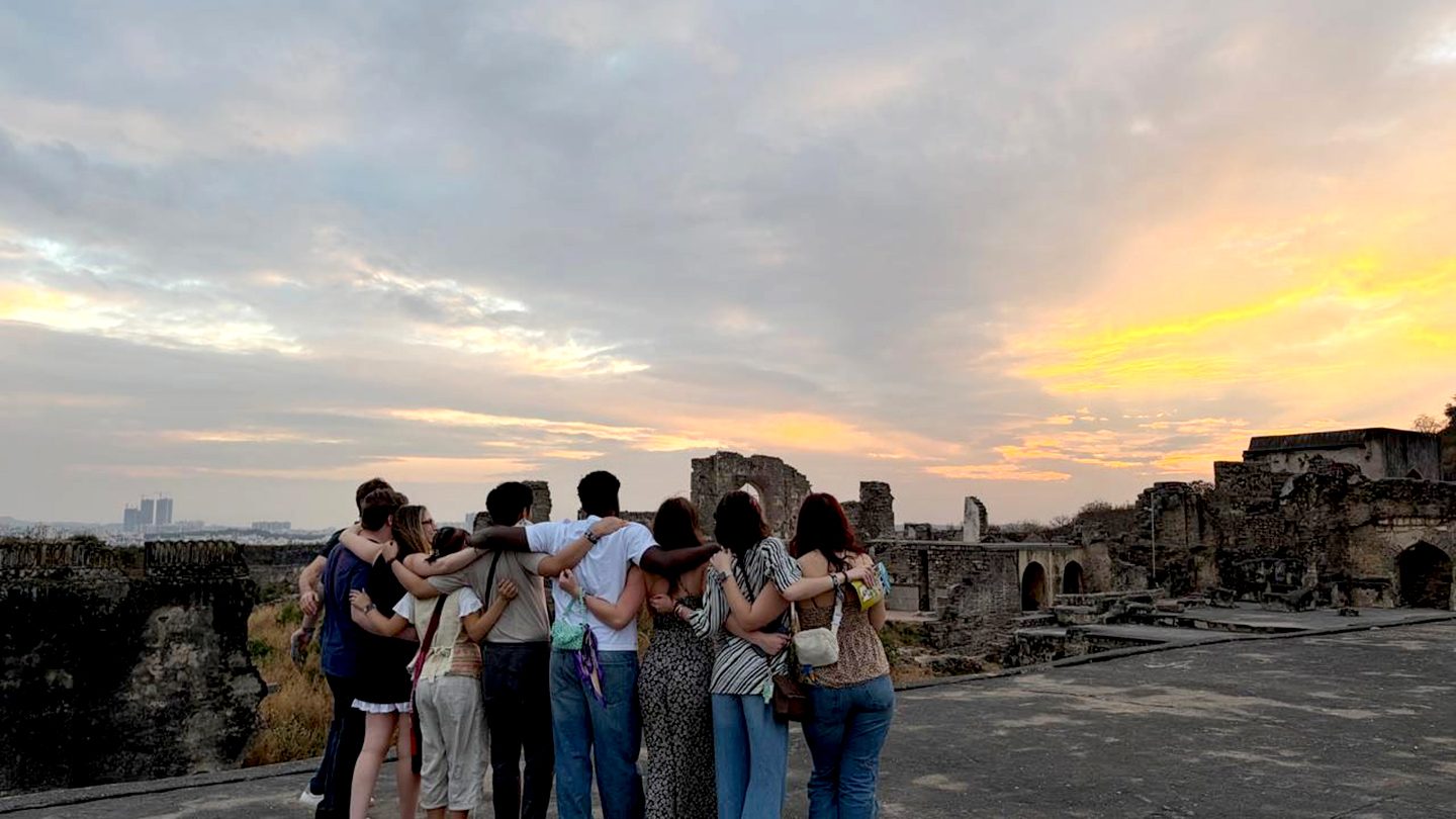 Adelphi Students traveled to India for and unforgettable experience. Students watch sunset in Hyderabad together.