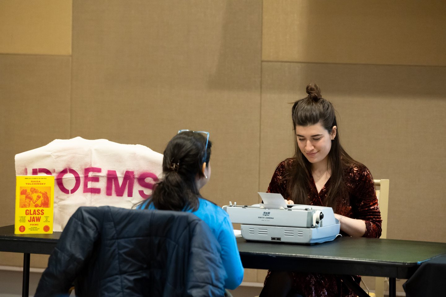 Raisa Tolchinsky showcased her Public Poetry Project, where she turned a single line suggested by an attendee into an original poem.