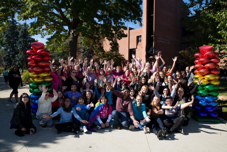 Adelphi students joyful with pride balloons