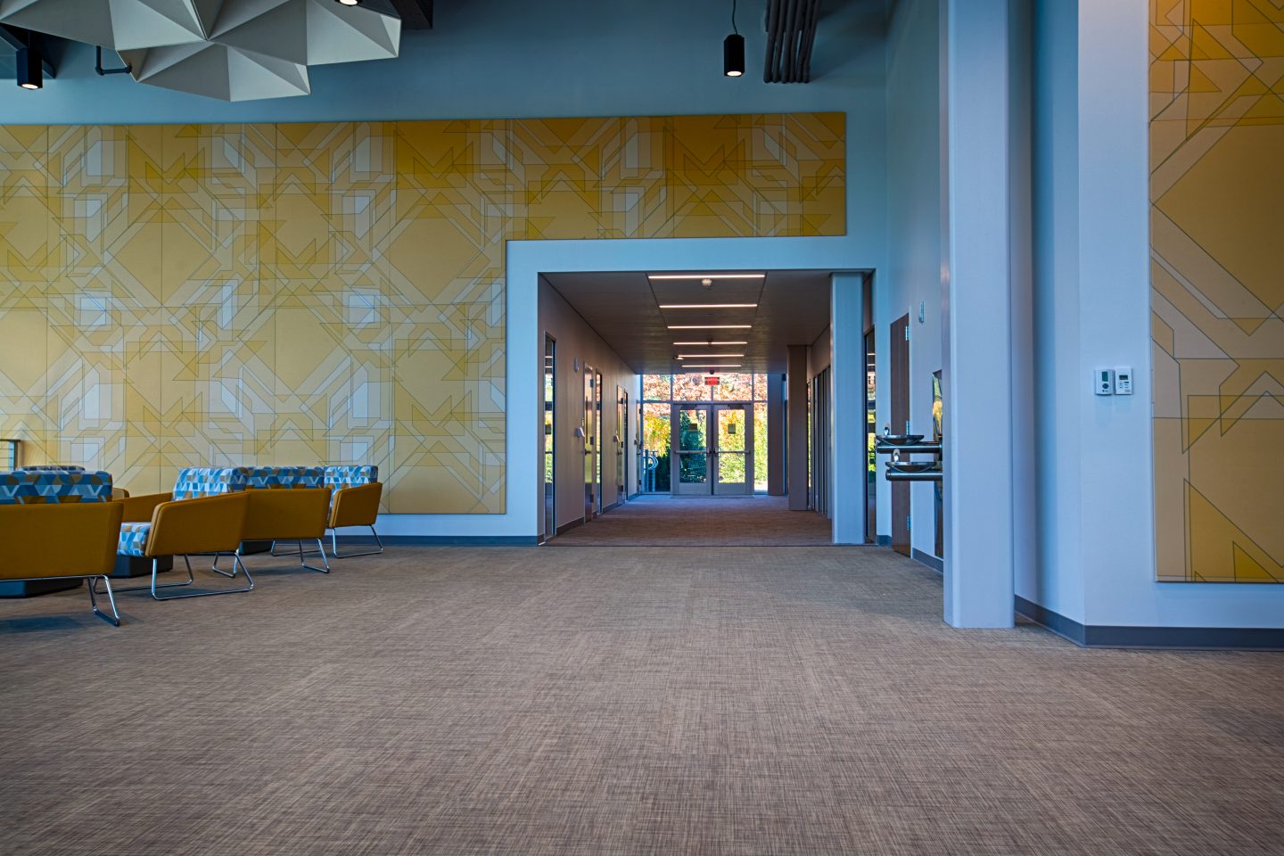 Wall artwork and a hallway in the UC