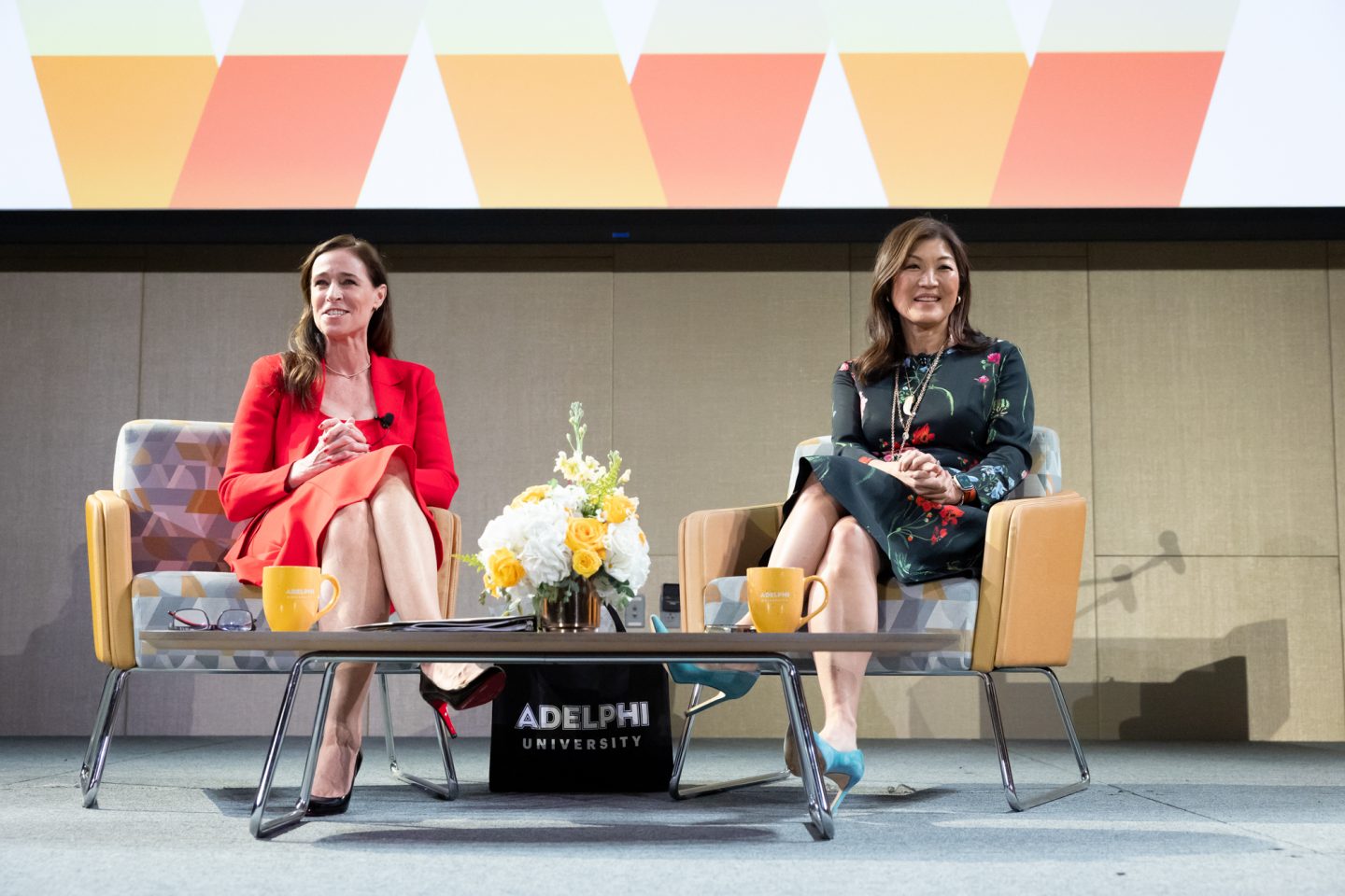President Christine Riordan and keynote speaker Juju Chang seated onstage