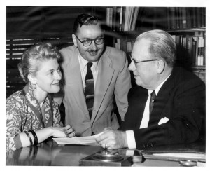 Gordon Derner (center) talking with Adelphi colleagues .