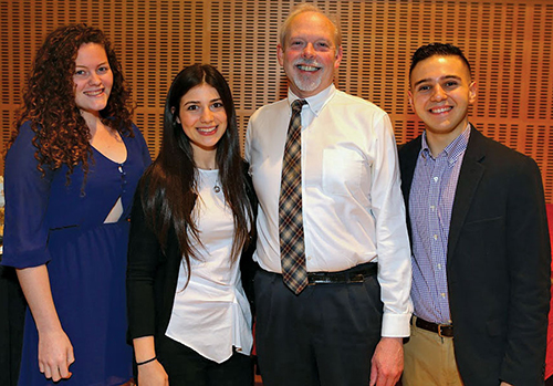 Students standing with Dean Richard Garner