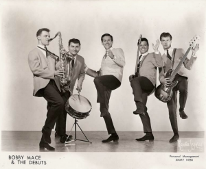 Dr. Mendelsohn with his bandmates in Bobby Mace and the Debuts