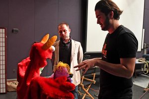 Student works with Puppets