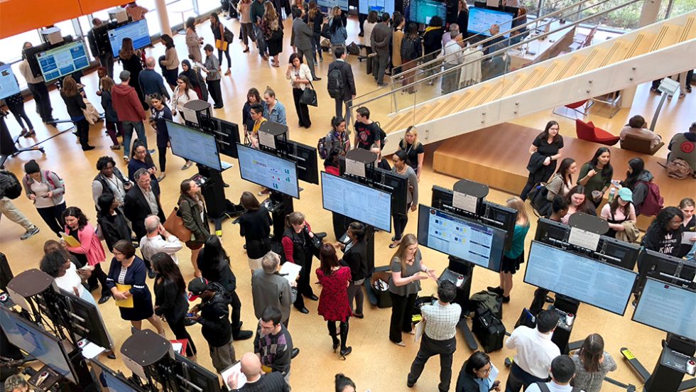 2018 Research Day at Adelphi - crowd of people in the Nexus Building looking at research posters