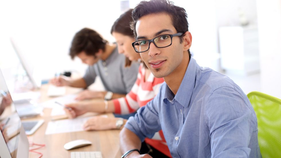 Stock photography: young professional in the workplace