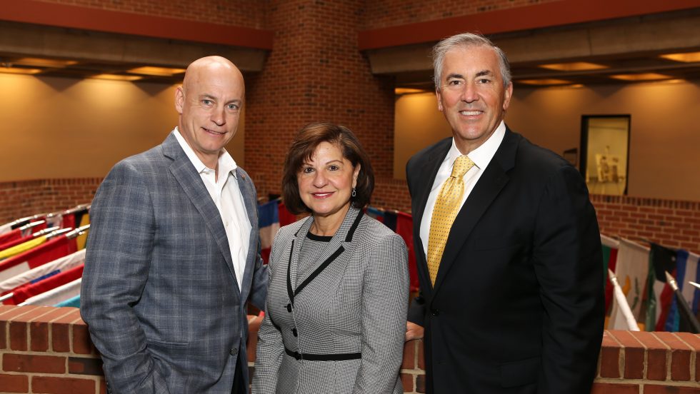 From left, Michael J. Tiedemann, Carmen M. Ortiz and Michael Balboni ’81, JD