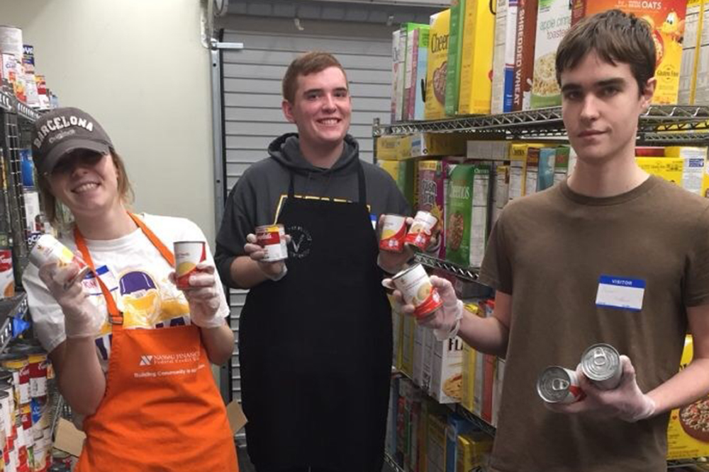 Students volunteering at a food pantry