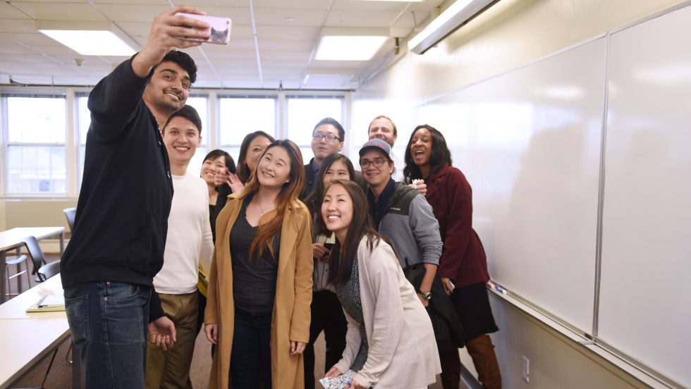 International students studying together for a selfie