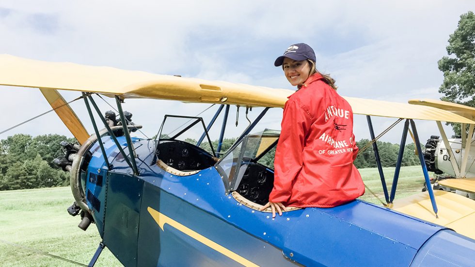 Janie Frazier sitting on a small airplane