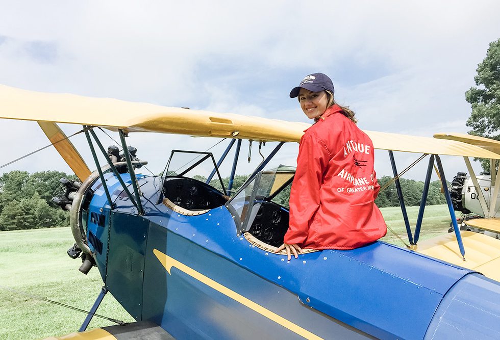 Janie Frazier sitting on a small airplane