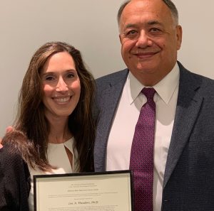 Lea A. Theodore, PhD and Visitng Professor Receiving Award