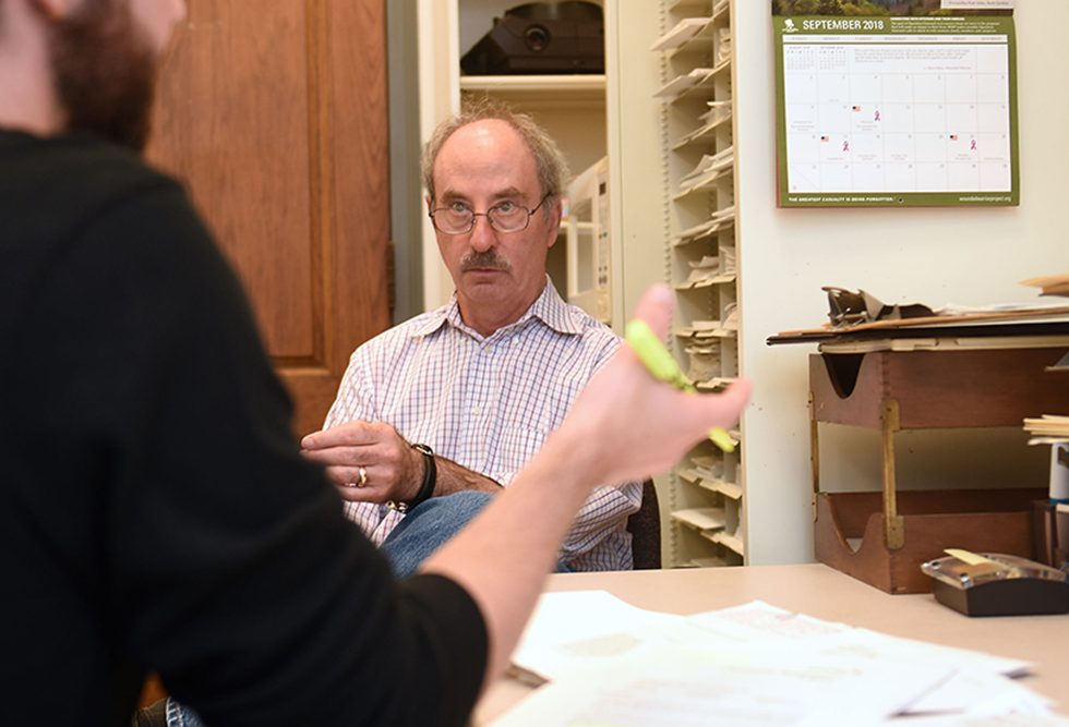 Professor Robert Bornstein, PhD working with an Adelphi psychology student.