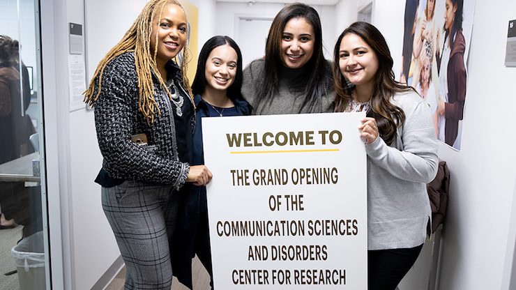 Adelphi faculty and students at the grand opening of the Communication Sciences and Disorders Center for Research.