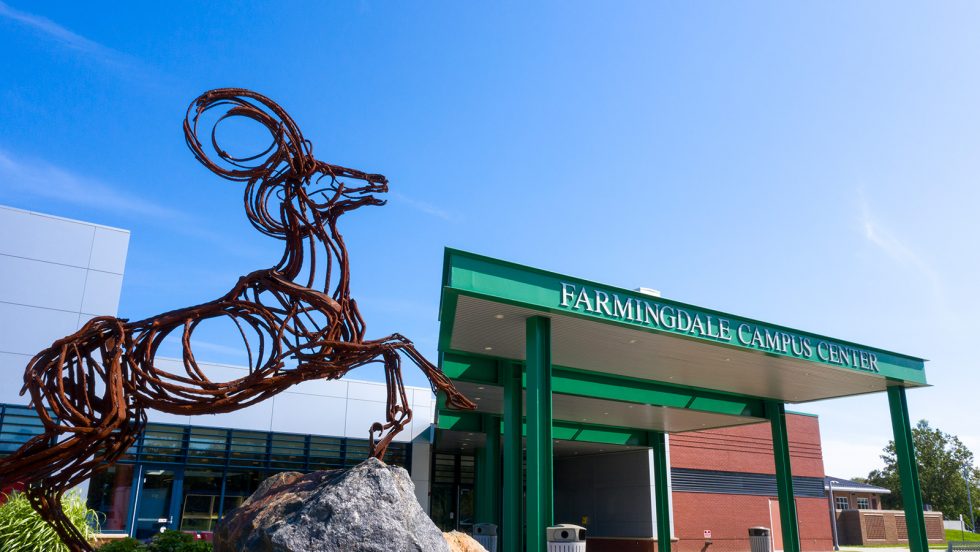 Farmingdale State College Campus with Ram sculpture.
