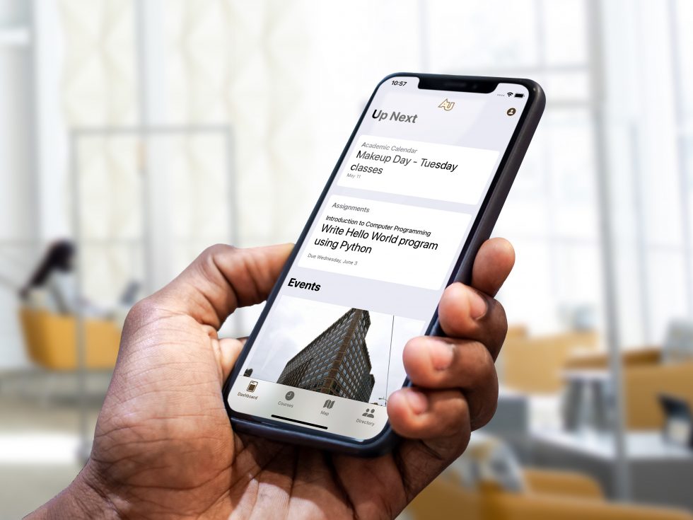 A person holding their phone with the new app up in the University Center