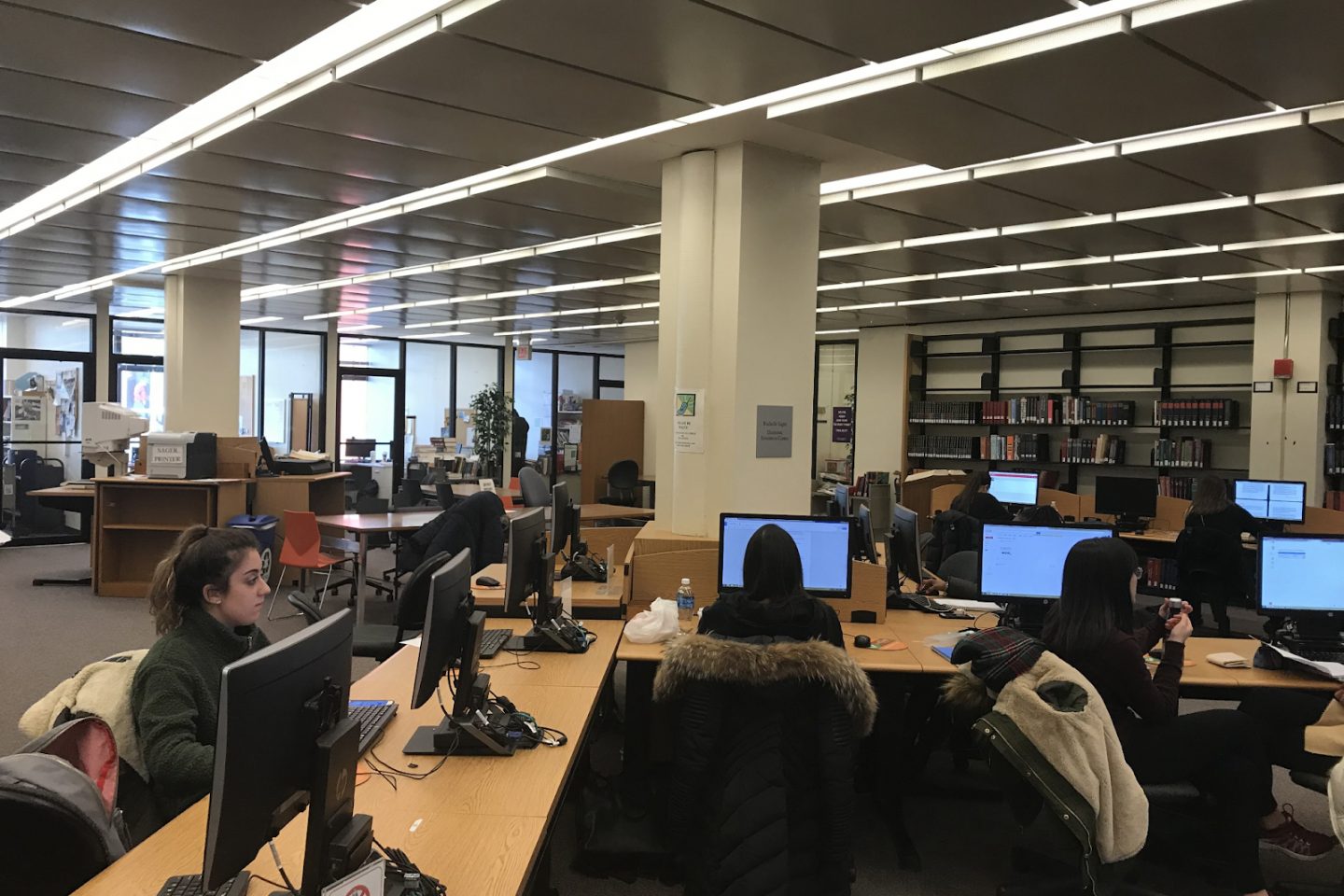 Students working on computers in the Sager Research Area in Swirbul Library