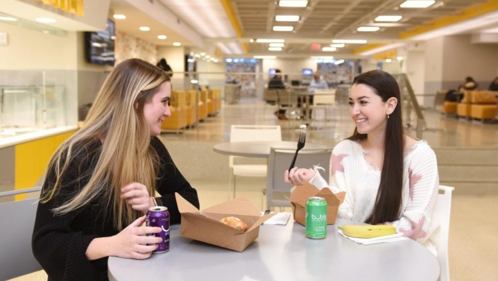 Adelphi students dining in the UC.