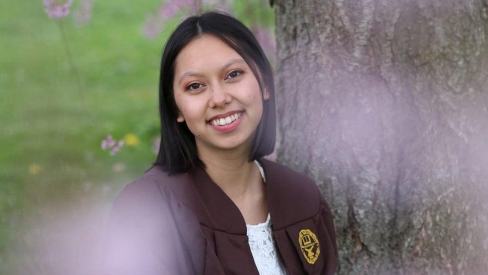 Gabi Vidad wearing her commencement regalia. 