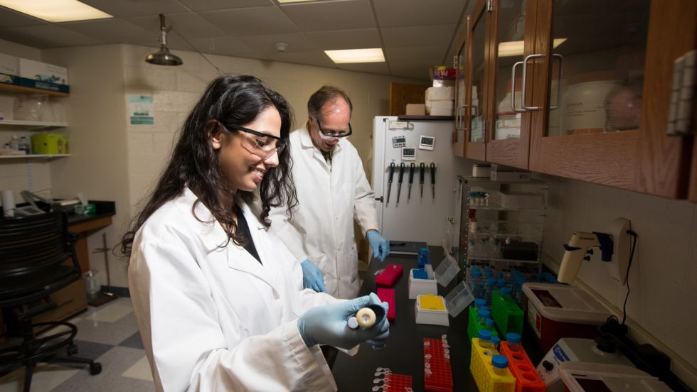 Brian Stockman and student in the lab.