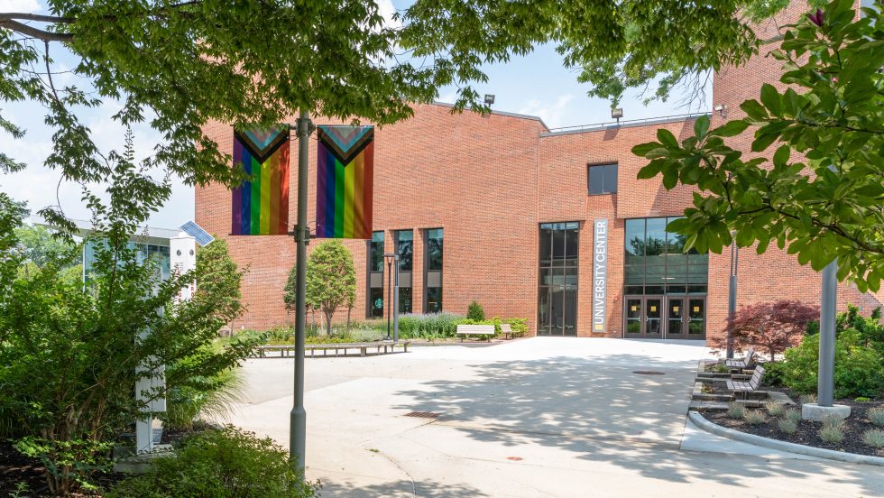 The new UC at Adelphi with pride flags in view.