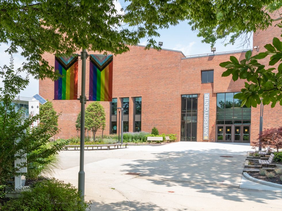 The new UC at Adelphi with pride flags in view.