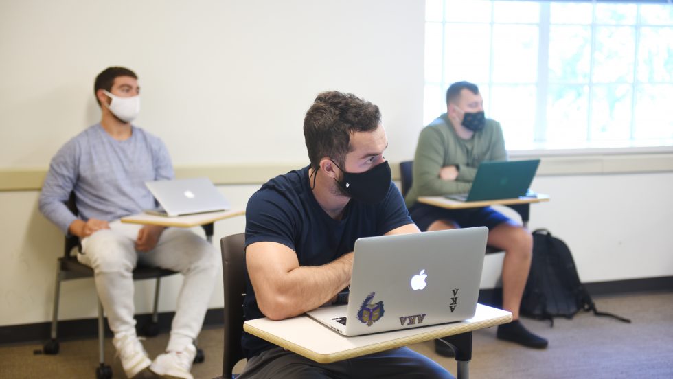 Students in class wearing masks.