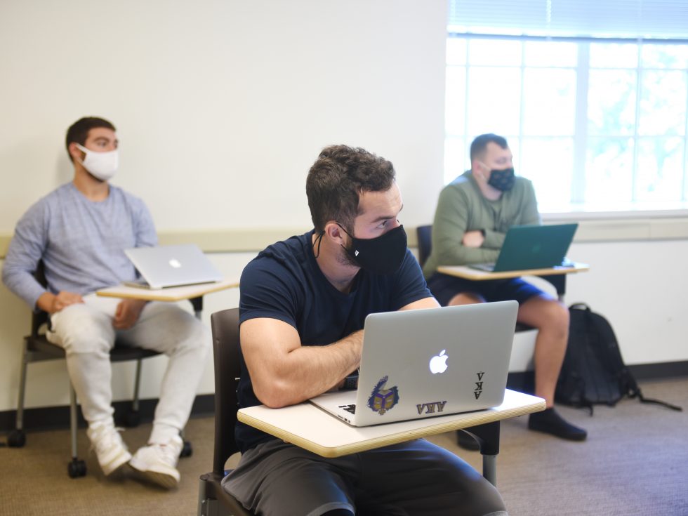 Students in class wearing masks.