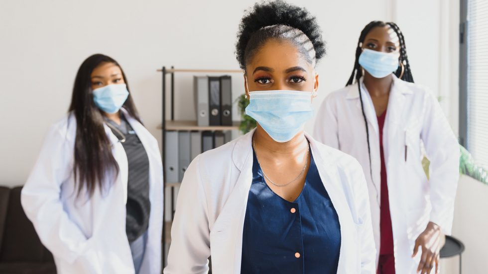 Nurses wearing COVID masks