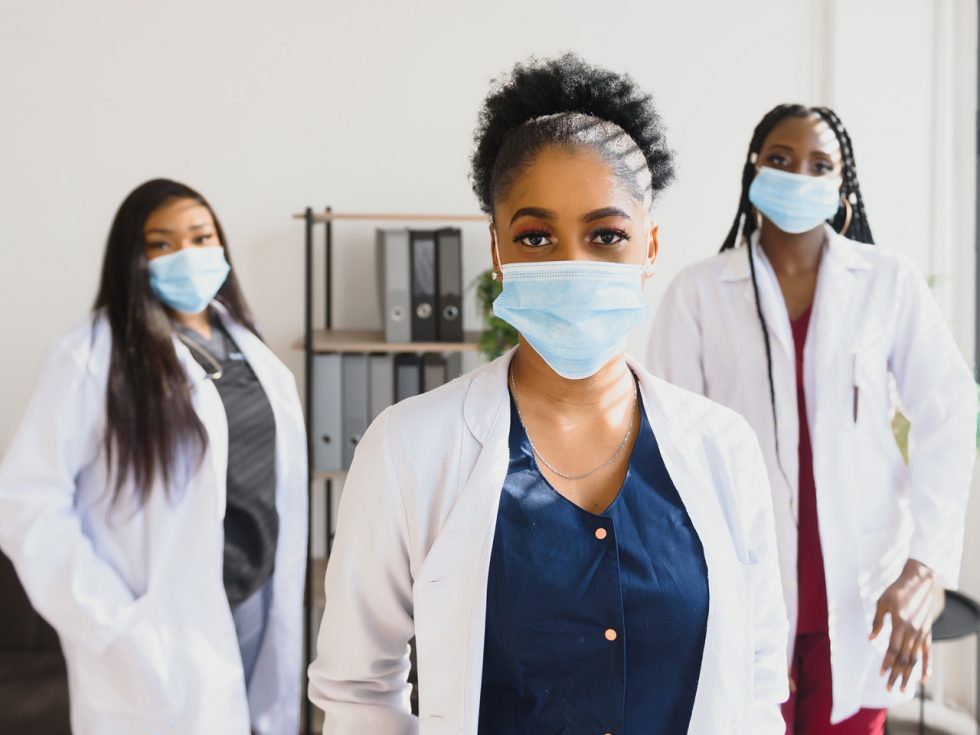 Nurses wearing COVID masks