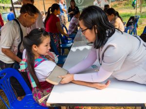 Adelphi public health student working with communities abroad