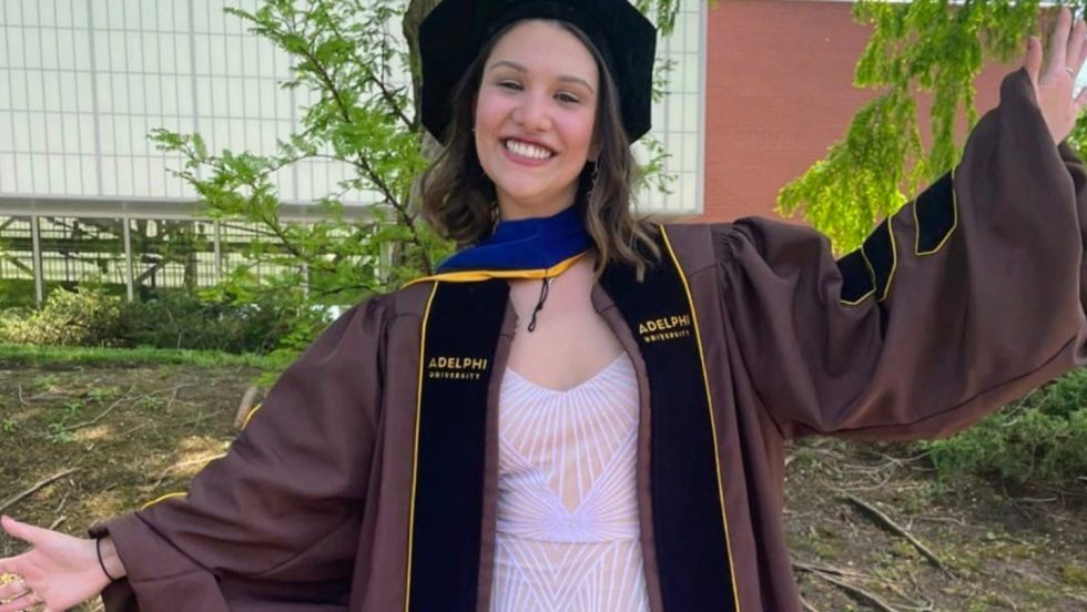 Adelya Urmanche, PhD ’22 in her academic regalia