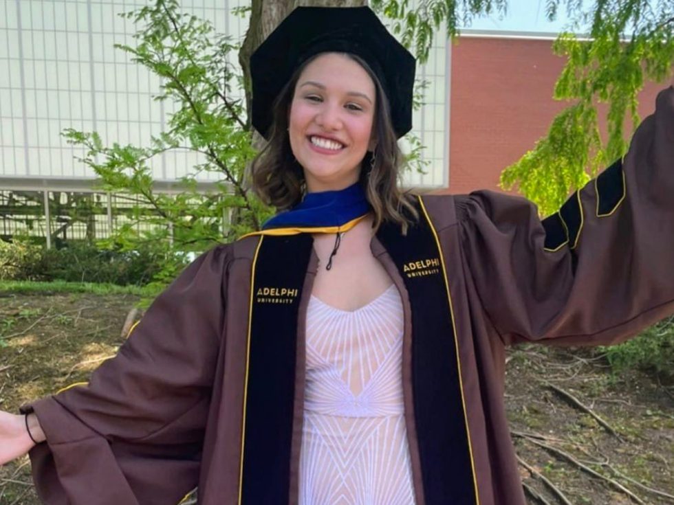 Adelya Urmanche, PhD ’22 in her academic regalia