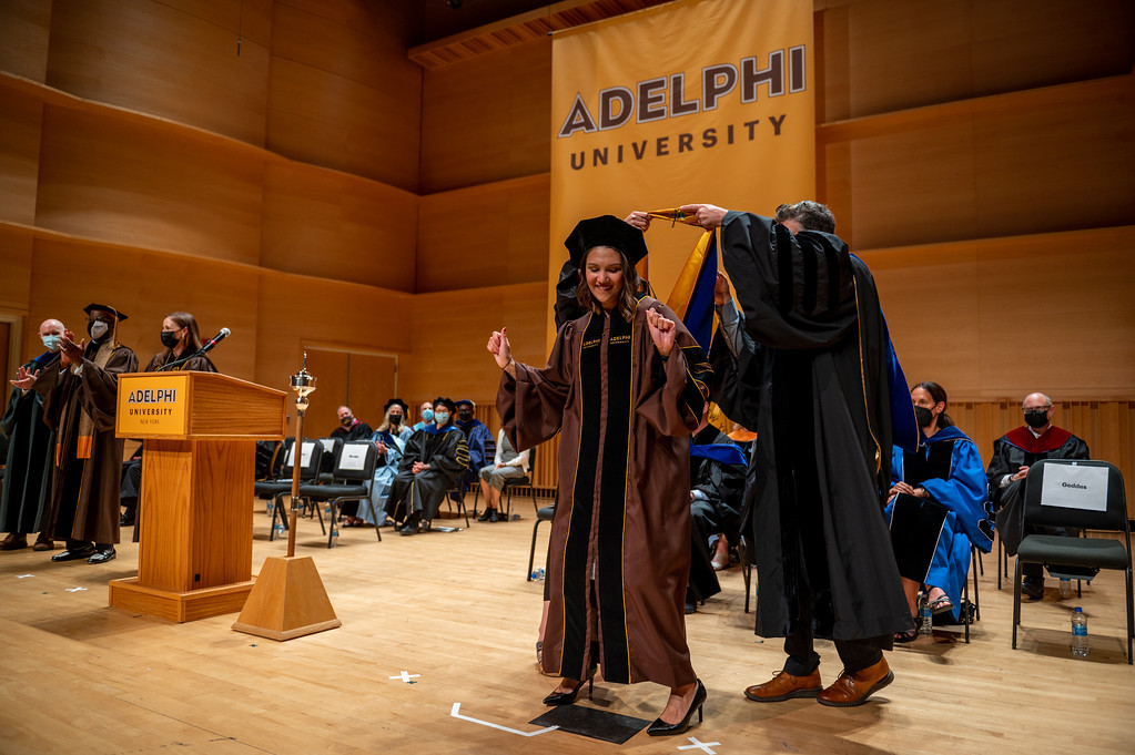 Adelya Urmanche, PhD '22 during the Doctoral Hooding ceremony at Adelphi University.