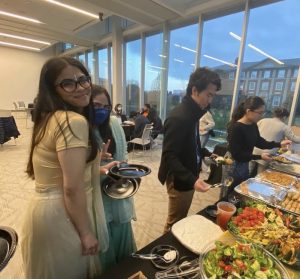 Students at an interfaith event receiving food