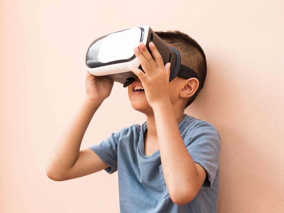 A child wears a VR headset