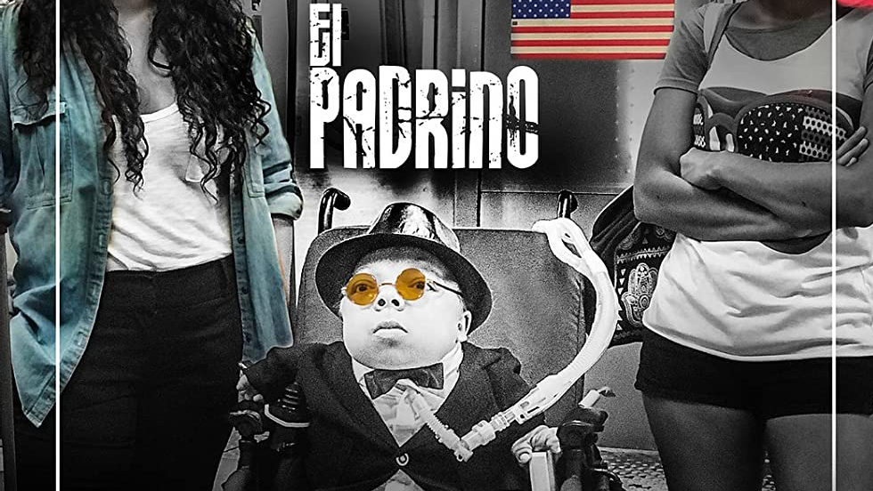 A man wearing a jacket, bow tie, glasses and hat sits in a wheelchair, with two women at his side; the image is partially colorized, as one of the women is given pink hair and the lenses of the man's glasses are gold; the name of the film, "El Padrino," is superimposed over the image, along with a subtitle reading "ICE melts in his hands" "ICE" is in all caps, suggesting the acronym of the U.S. government's Immigration and Customs Enforcement bureau.