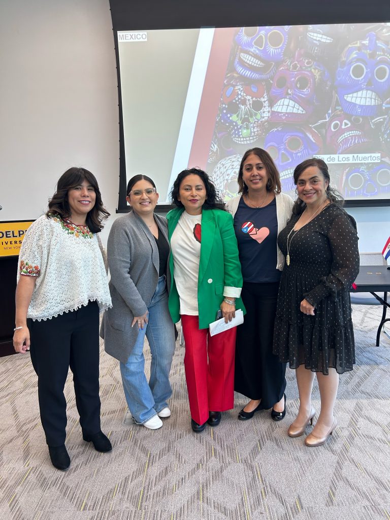 Adelphi HSI Task Force Members - Group photo at a Hispanic Heritage Month event on campus.