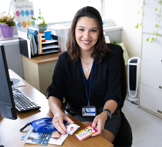 Adelya Urmanche at the desk in her office.