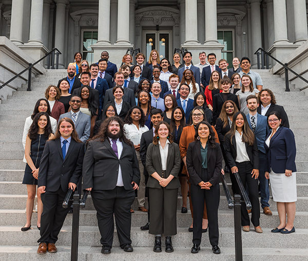 A group photo of the 48 U.S. Digital Corp fellows, taken on the steps of the Eisenhower Executive Office Building.