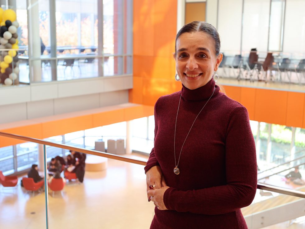 Dr. Gannon in the Nexus Building on Adelphi's Garden City campus