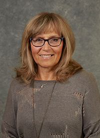 Headshot of Kate Szymanski