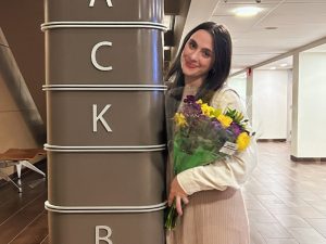 Katie Goz (pictured) outside of The Black Box Theatre at Adelphi's Performing Arts Center.