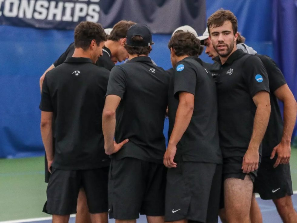 Group of men on a tennis court