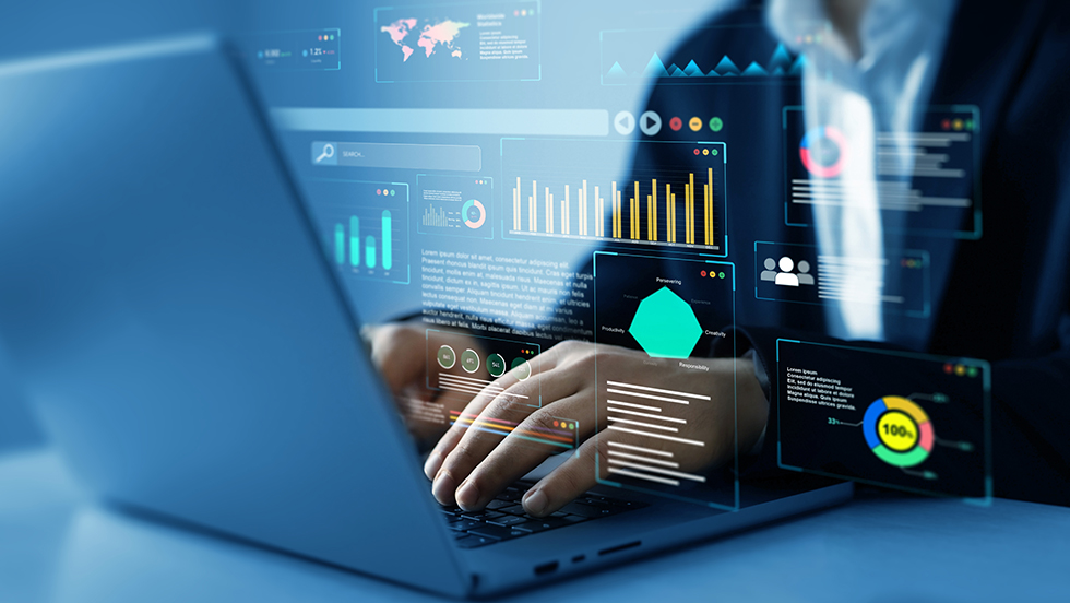 Woman's hands typing on a laptop with digital data, charts and graphs superimposed, symbolizing data analysis and technology