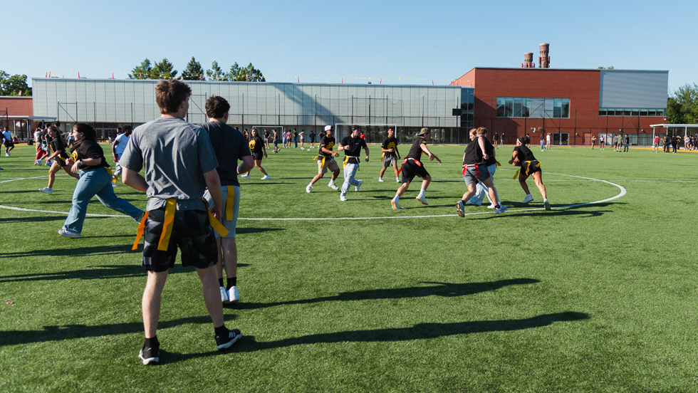 Dozens of players in action on the field