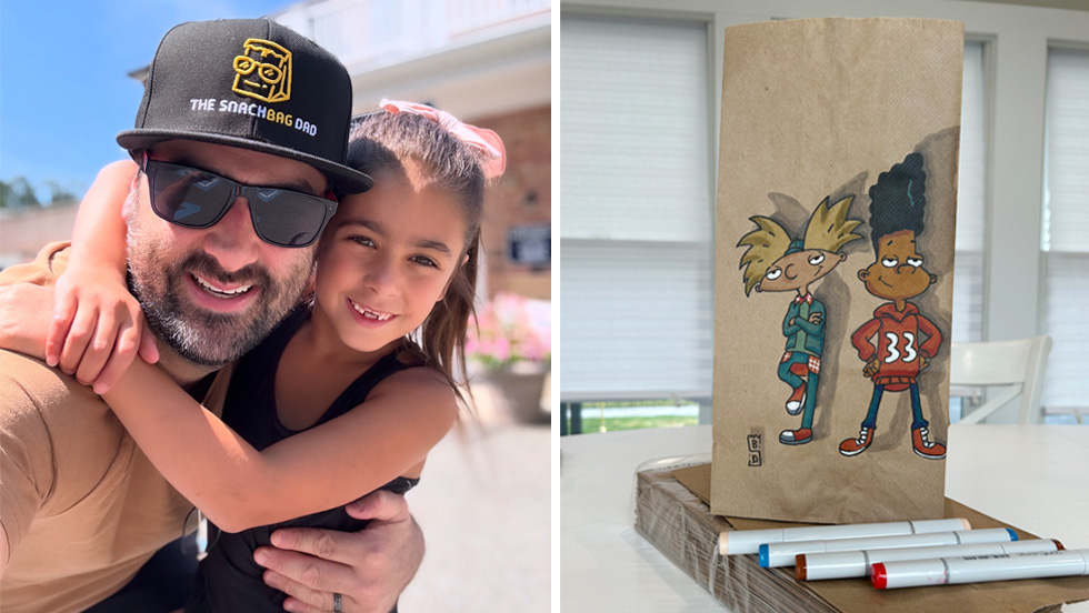 A split image. On the left, a man wearing a black baseball cap that reads "THE SNACKBAG DAD" and sunglasses smiles while embracing a young girl with a pink bow in her hair. On the right, a brown paper lunch bag stands upright, featuring a hand-drawn illustration of the cartoon characters Arnold and Gerald from "Hey Arnold!" Markers are visible below the bag.