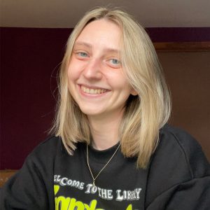Young blond woman smiling