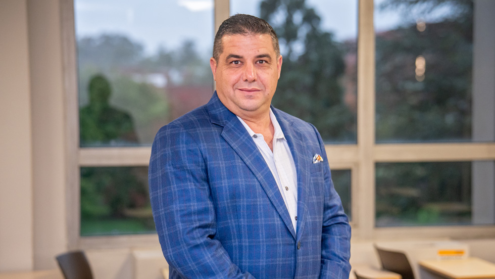 Headshot of Kris Amplo